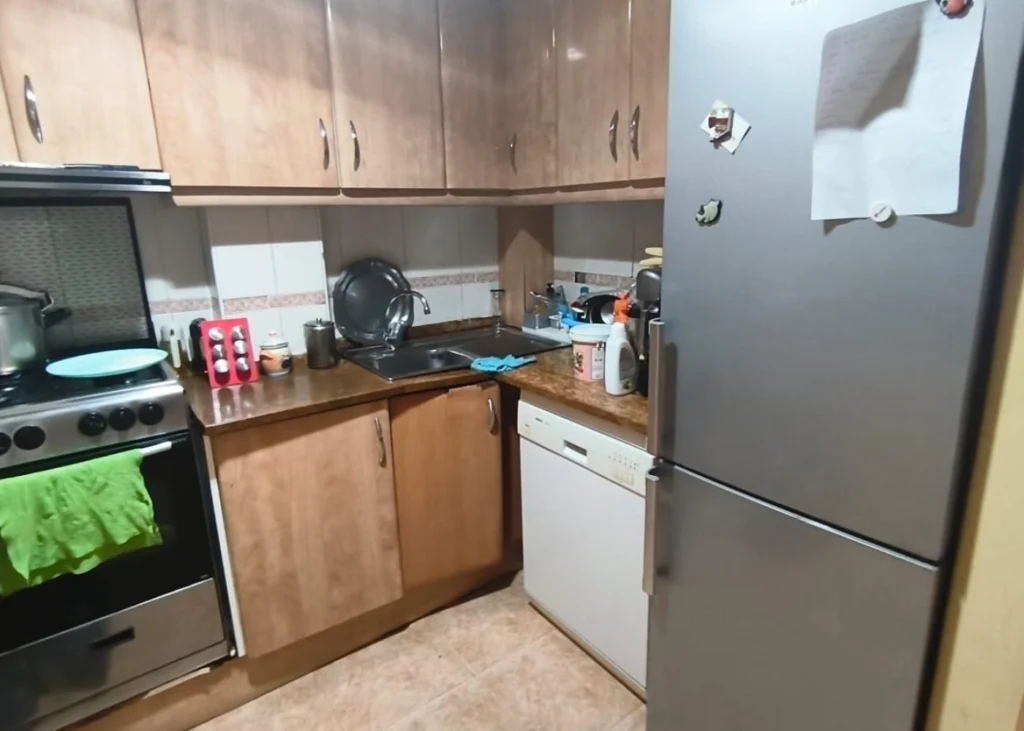 Cocina, zona de fregadero y nevera, Piso de 3 habitaciones en venta en Canet de Mar